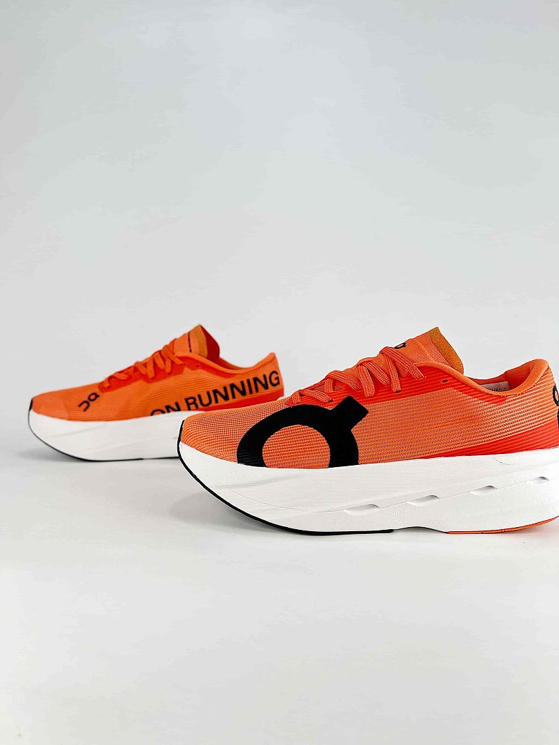 On Cloudboom Volt Orange Black Running Sneakers Women Men 3MF30984553